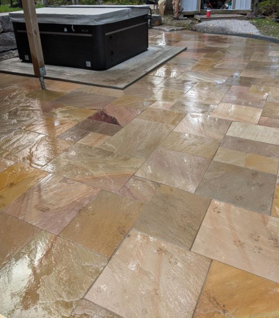 Paver patio and hot-tub pad with deck in the Kawarthas