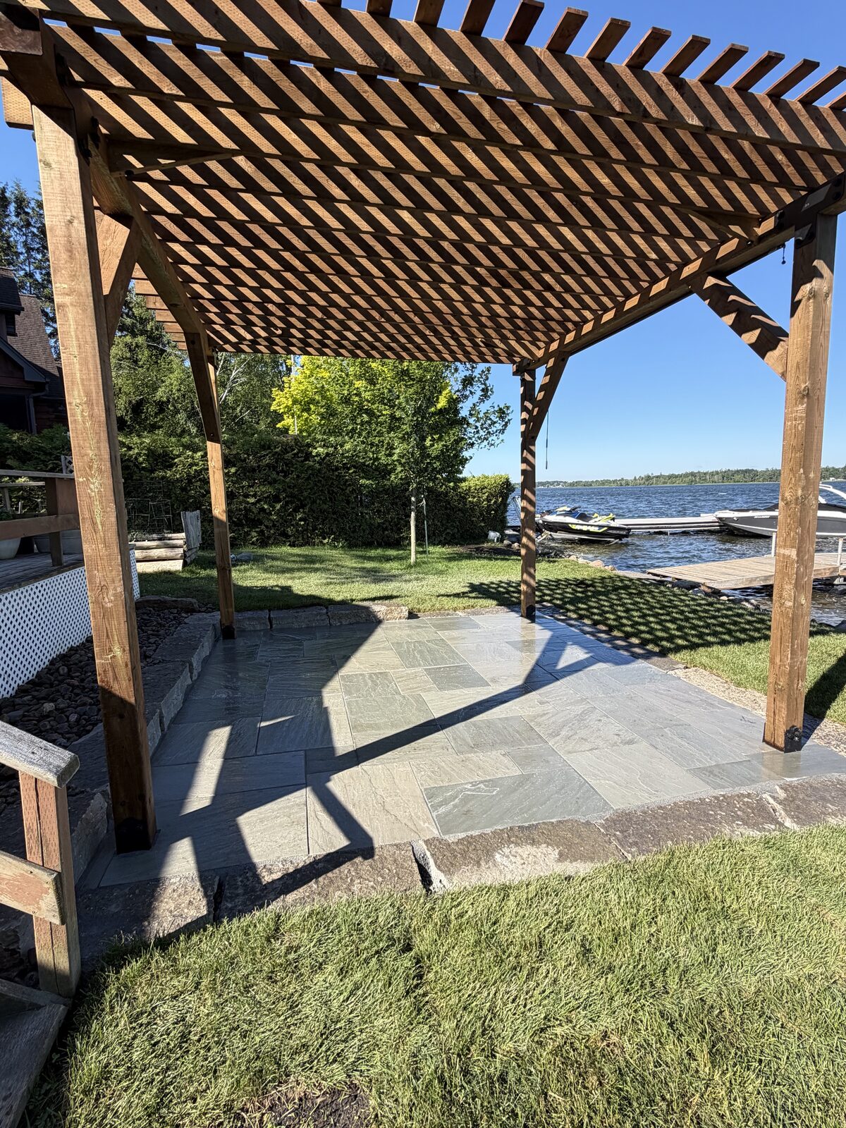 Cedar pergola with lake view — Chemong Lake