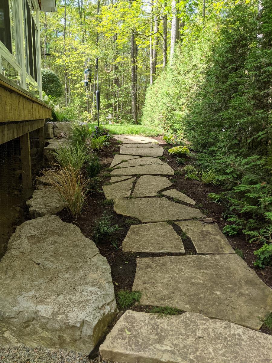 Grasses, gardens & flagstone — Lakefield