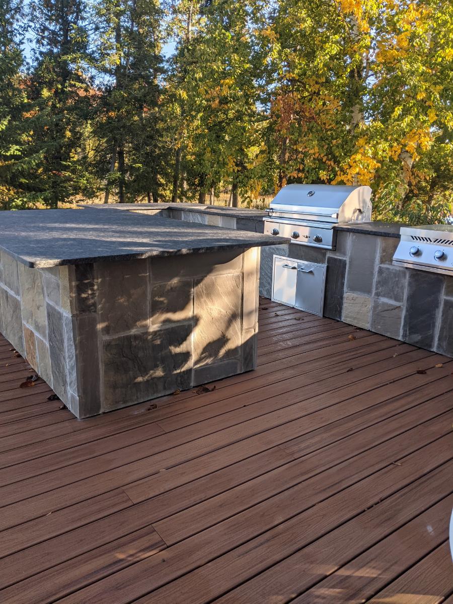 Composite Trex deck and outdoor kitchen in the Kawarthas