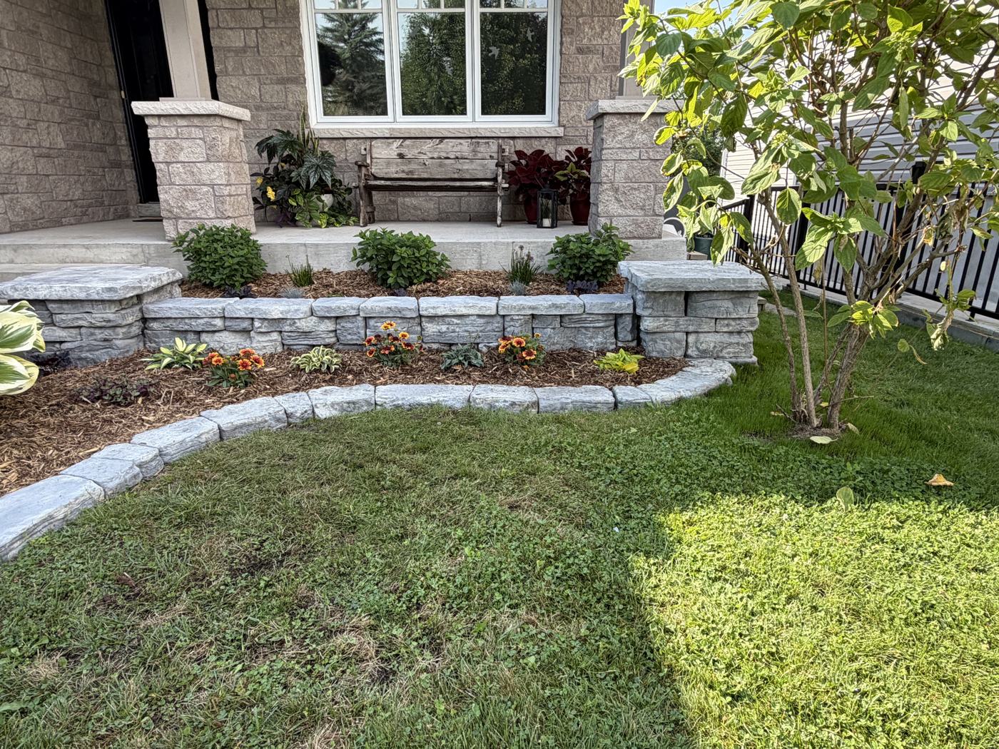 Stone garden edging & planted beds — Lakefield